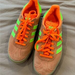 Platform orange and lime green adidas samba sneakers